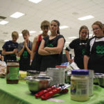 Intermediate 4-H members survey the ingredients they could use to make beef vegetable soup during the 4-H Manitoba Food Challenge Provincial Championship June 10.