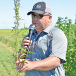Jeff Kostuik, central region director of operations for Hemp Genetics International, speaks on hemp agronomy and variety improvements during a field day in Melita July 25.