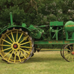 The Model N tractor donated by the estate of August Eliason of the Gimli area. Waterloo used a two-cylinder engine design as it was cheaper to manufacture than a multi-cylinder engine. Being a shorter engine block, the two-cylinder design could be more easily mounted crosswise on the chassis, simplifying the transmission and mounting the clutch out on the side of the tractor where it could be more easily serviced if necessary. One further advantage claimed for a two-cylinder engine was that intake/exhaust manifold was relatively short with a corresponding short distance between the carburetor and the cylinders. So when burning kerosene there was a reduced possibility of vaporized fuel re-forming as a liquid as it travelled to the cylinder for combustion.