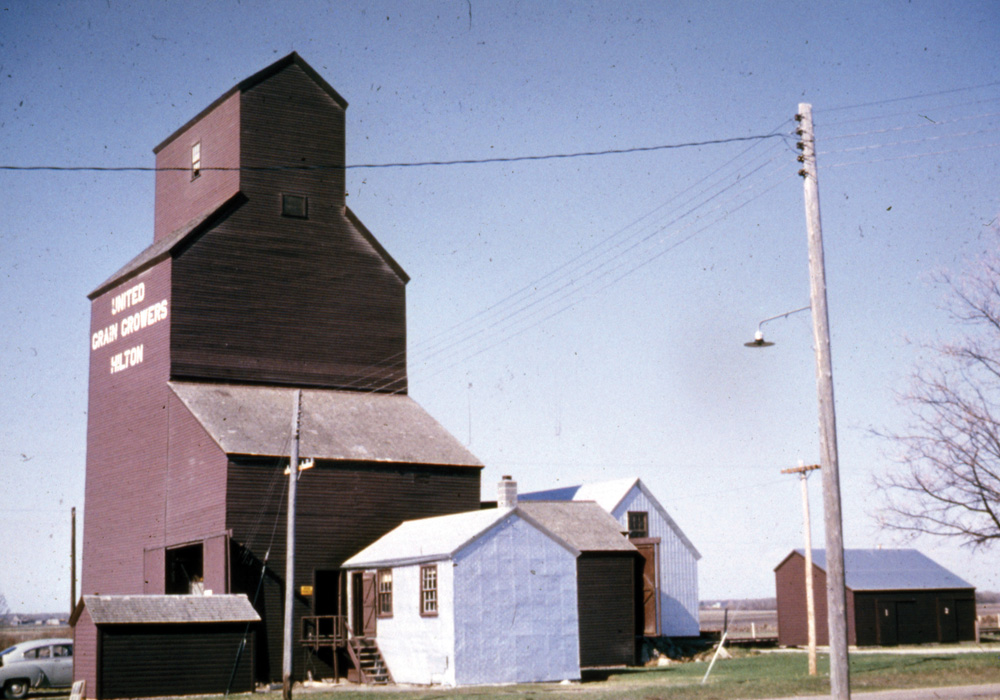 Built in 1927 for United Grain Growers, a 30,000-bushel grain elevator  in the village of Hilton, on the CNR Wawanesa Subdivision in what is now  the Rural Municipality of Prairie Lakes, was closed in July 1966, never  having had an annex built beside it. The last of three elevators that  once stood at Hilton, the building was traded to Manitoba Pool in 1976  and moved 12 miles to Ninette, where it replaced an elevator that had  collapsed suddenly. It stood there until demolition in 1989.