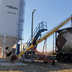 Loading a producer car at the Boundary Group Inc. facility at Darlingford, Man., on the short line owned and operated by the Boundary Trail Railway Company. CP Rail is closing 17 producer car loading sites across the West, including two in Manitoba — Foxwarren and Strathclair.