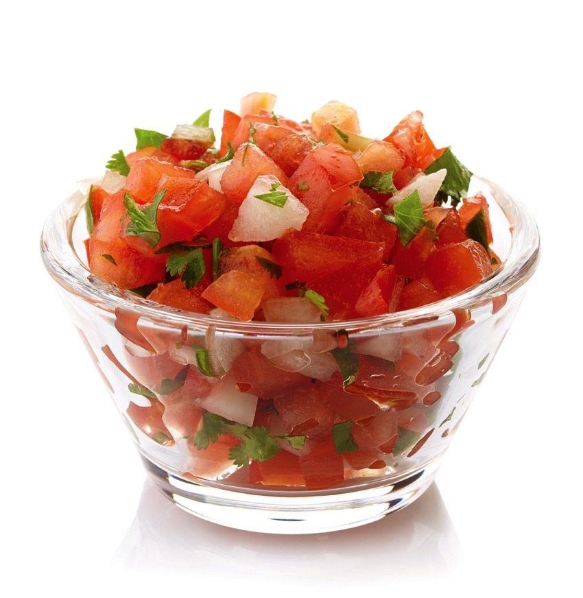 Bowl of fresh salsa dip isolated on white background