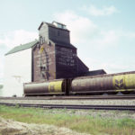 A 30,000-bushel wooden grain elevator in Kirkella was built in 1923 by the Matheson-Lindsay Grain Company, founded by
W. J. Lindsay, a former partner of W. L. Parrish of Parrish & Heimbecker. It was sold in 1928 to the Province Elevator Company and successively to the Canadian Consolidated Grain Company (1929), United Grain Growers (1959), and Manitoba Pool (1960). Renovated in 1965 and 1975, a 60,000-bushel crib annex was built beside it in 1969. The elevator was demolished in 2002.