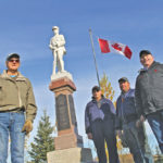 Local residents (l to r) Ross McMillan, Bill Morrow, Chris Monk and Derek Jackson — who also serve on the local cemetery board — are committed to maintaining the community’s war memorial.