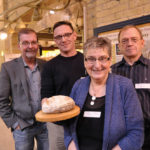 Scott Stothers (l to r), Loic Perrot, Tabitha Langel, and Doug Cattani with bread made from Kernza.