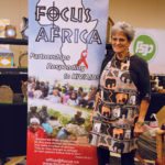 Myrna Ronald, a volunteer for Focus Africa, with their display at Manitoba Farm Women’s Conference.