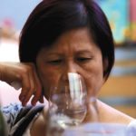 A Chinese woman drinks wine during a tasting at Peterson’s Winery in the Hunter Valley, located north of Sydney in Australia, February 14, 2018.