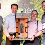 Baker Colony won the Manitoba Corn Growers Association’s (MCGA) corn yield competition for the third year in a row with a record yield of 306.4 bushels an acre. The results were announced Feb. 14 at the CropConnect banquet in Winnipeg. Mack Waldner (second from right) received the competition trophy from MCGA president Myron Krahn (second from left) along with MCGA director Leonard Wiebe (l) and $1,000 from John McCulloch of DuPont Pioneer.