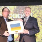 Manitoba Canola Growers Association president Chuck Fossay (l) presented Teulon farmer and former seed grower Murray McConnell with the Canola Award of Excellence for 2018 in recognition of his contribution as an early canola seed grower.