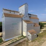 In late 1975, the CPR line between Carman and Kronsgart was abandoned. The Manitoba Pool elevator at Kronsgart closed in December 1976. It had been built for a local co-operative in 1952, along with a crib annex, to replace an elevator destroyed by fire in December 1949. A second crib annex had been added to it in 1955. In 1979, the Kronsgart elevator and annexes were moved 16 miles north to Homewood where they were renovated into a modern, high-throughput facility with a capacity of 186,000 bushels. Closed by Agricore in 2002, the elevator was sold into private ownership and put up for sale again in late 2014.