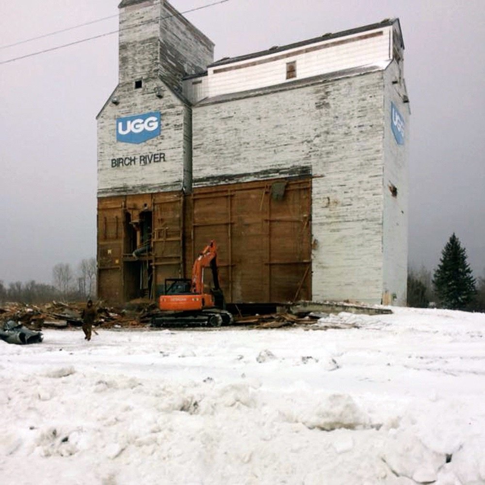 A former United Grain Growers elevator, believed to have been built around 1950 and considered a local landmark, was demolished at Birch River, Man. last week.