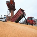 Workers transport imported soybeans at a port in Nantong, Jiangsu province, China April 4, 2018. U.S. farmers worry they’ll be shut out of a major market due to a brewing trade war.