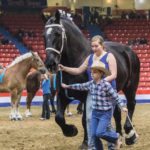 Breanne Bourns of Cartwright was there to help her niece eight-year-old Meadow Minnie in the youth showman class in the draft horse section of the fair.