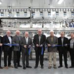Guy Baudry, (l to r) HyLife Foods division chief operating officer, HyLife executive chief operating officer Denis Vielfaure, local MP Robert Sopuck, Manitoba Agriculture Minister Ralph Eichler, HyLife president Claude Vielfaure, Neepawa Mayor Adrian de Groot, company board chair Don Janzen and CEO Grant Lazaruk cut the ribbon at the newly expanded HyLife Foods plant in Neepawa.