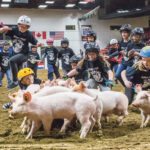 Both city kids and farm kids lined up to partake in the two pig scrambles held during the week. After the show a local producer raises them to market weight and the meat is donated to food banks and emergency kitchens in the region. 