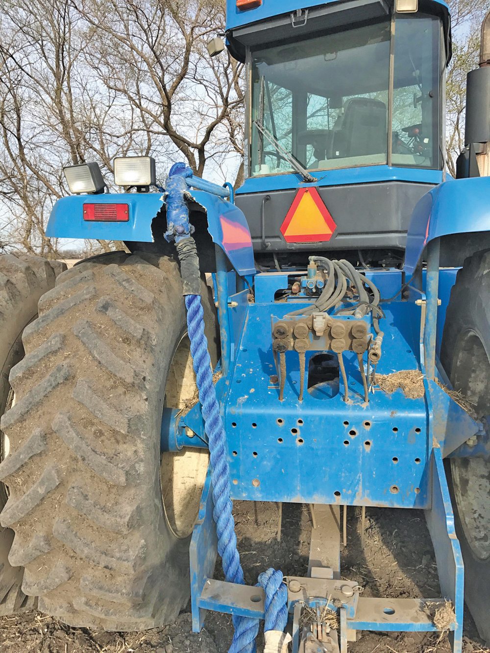 Wawanesa-area farmer Simon Ellis says a flying hook’s impact shattered the fibreglass fender of the tractor being used to pull out a stuck truck last spring. 