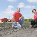 Darren and Angie Cormier, shown here May 31, operate Cormier's Berry Patch at La Salle.