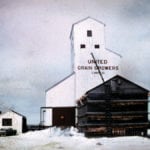 A 52,000-bushel elevator at Rufford siding, about seven miles southwest of Minnedosa in what is now the Rural Municipality of Minto-Odanah, was built around 1951 by United Grain Growers, on a similar plan to one at nearby Cordova siding. In this photo from 1961, we see that it had a balloon annex. Closed in April 1968, Rufford was demolished in April 1971. Cordova was closed in July 1970 and demolished in 1972. The railway line was abandoned in 1978.