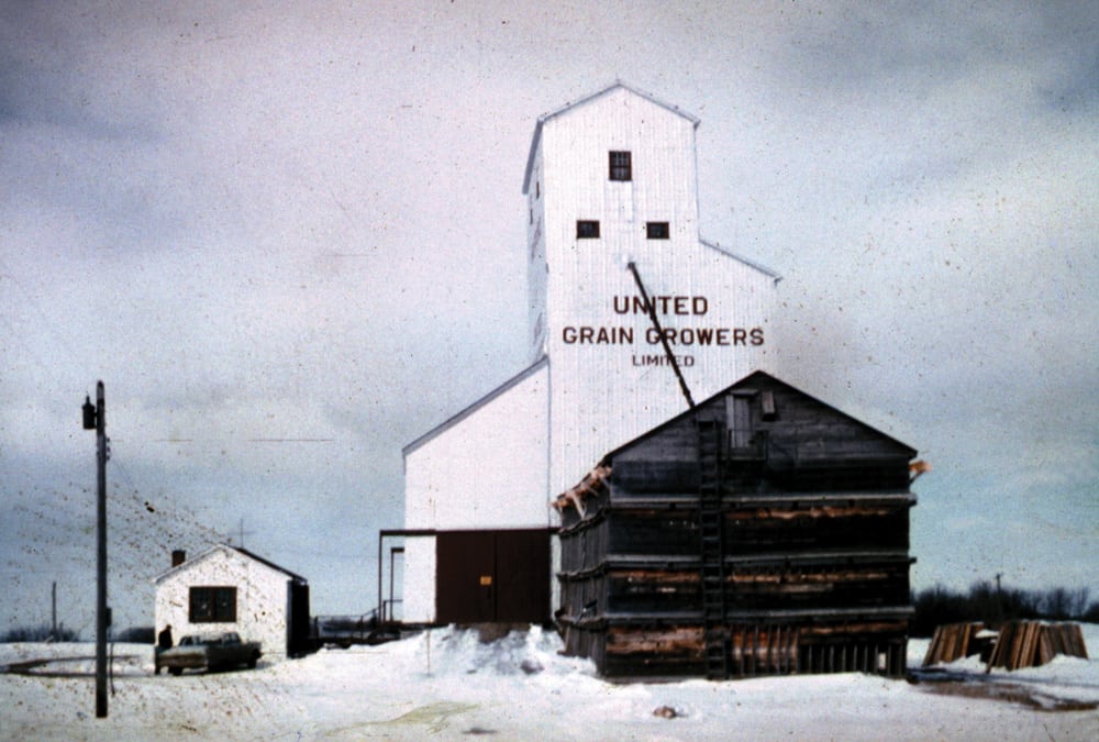 A 52,000-bushel elevator at Rufford siding, about seven miles southwest of Minnedosa in what is now the Rural Municipality of Minto-Odanah, was built around 1951 by United Grain Growers, on a similar plan to one at nearby Cordova siding. In this photo from 1961, we see that it had a balloon annex. Closed in April 1968, Rufford was demolished in April 1971. Cordova was closed in July 1970 and demolished in 1972. The railway line was abandoned in 1978.