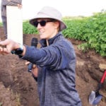 Manitoba Agriculture’s Marla Riekman digs into the soil strata below the Canada-Manitoba
Crop Diversification Centre potato site near Carberry Aug. 14.