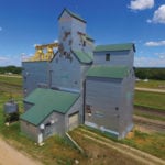 A 50,000-bushel elevator at Arden was built in 1926 by Manitoba Pool Elevators. In 1952, the 30,000-bushel “Pool B” elevator (purchased from Western Canada Flour Mills in 1940) was moved beside it and converted to an annex. Renovated in 1970, a new 60,000-bushel crib annex was added in 1981. Closed by Agricore in the summer of 1999, it was sold in 2001 to the 80-member Canadian Organic Commodity Marketing Coop then reopened in January 2003, after a period of intensive cleaning, as the first certified organic-only elevator in Manitoba. Closed in 2006, the elevator was purchased by the Rolling Acres Hutterite Colony for its own grain storage needs.