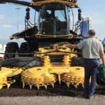 Dan Strieggl and his son Issac inspect new farm equipment at the 2018 Farm Progress Show in Boone, Iowa, U.S.,
August 28, 2018.