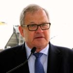 Federal Agriculture Minister Lawrence MacAulay says U.S. wheat will be treated exactly like Canadian wheat which means unregistered varieties will automatically receive the lowest grade.