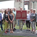 A Historic Sites and Monuments Board of Canada and Parks Canada plaque commemorating the importance of grain transshipment to Canada’s international grain trade is unveiled this summer. Friends of Grain Elevators board members (l to r) Robert Paterson, Bill Reist, Batia Stolar, Jim Ball, Kathleen Baleja, Herb Daniher, Gerry Heinrichs, Penny Stradeski, Ann Donaldson, Nancy Perozzo, Charla Robinson.