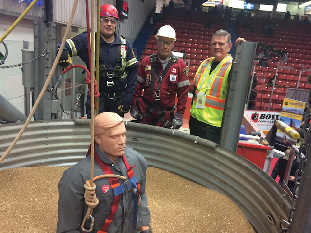 Farm safety will be front and centre at this year’s edition of Ag Days. Richard Paetzold (left), Garth McIntyre and Glen Blahey, (right) demonstrating how a rescue would occur in the event of a grain entrapment.