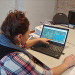 Jodi Goerzen, Seine Rat River Conservation District manager, looks at LIDAR watershed maps on her computer. The maps are being developed as part of a larger flood and drought resiliency plan being developed for the CD.