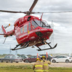 Members of the RM of Rosser volunteer fire department help guide STAR-7 in for a landing.