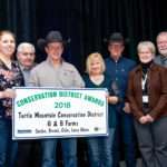 Gordon and Brenda Adams and their children Colin and Lacey were the recipients of the 2018 Turtle Mountain Conservation District Award presented at the December 10 MCDA banquet in Brandon.
