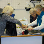 Lois Davison (left), along with Eileen Kowaluk (back) and Betty-Ann Cottingham sort and prepare donated product at the Value Shoppe in Birtle.