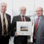 Former agriculture minister Gerry Ritz (centre) was presented with an Honorary Life Membership Award in recognition of his outstanding contributions to the canola industry by council president Jim Everson (l) and outgoing chair David Dzisiak.