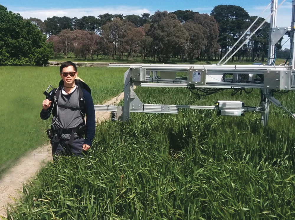 Dr. Alex Wu performing research in the field.