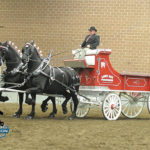 Jim Lane handles the lines of a team at the World Percheron Congress this past fall at Des Moines, Iowa.