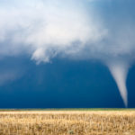 Tornado with dark storm clouds
