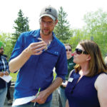 Aaron Vanbesclaere (left) gets a lesson on Japanese brome from ACC instructor Danielle Tichit
during a Weed Seedling Identification Day in Brandon May 29.