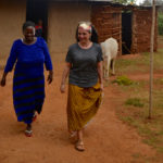 Colleen (r) and Lucy take a walk on her farm in Kenya.
