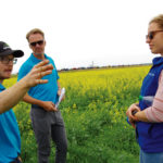 Blake Weiseth (l) outlines some of the demonstrations underway this summer at the new site.
