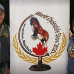 Reg and Carol Madsen are proudly promoting the banner of the World Clydesdale Show, featuring the logo designed free gratis by their daughter Karen Cobbs.
