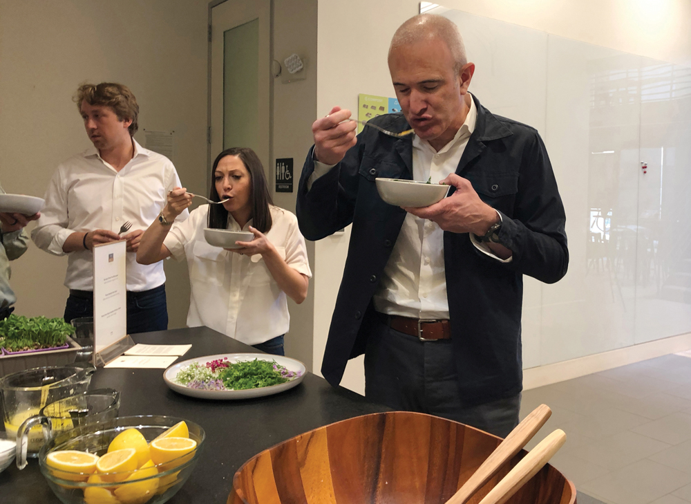Plenty CEO and co-founder Matt Barnard (right) says his company is now competitive with organic  competitors but critics say vertical farms are simply too expensive to run.