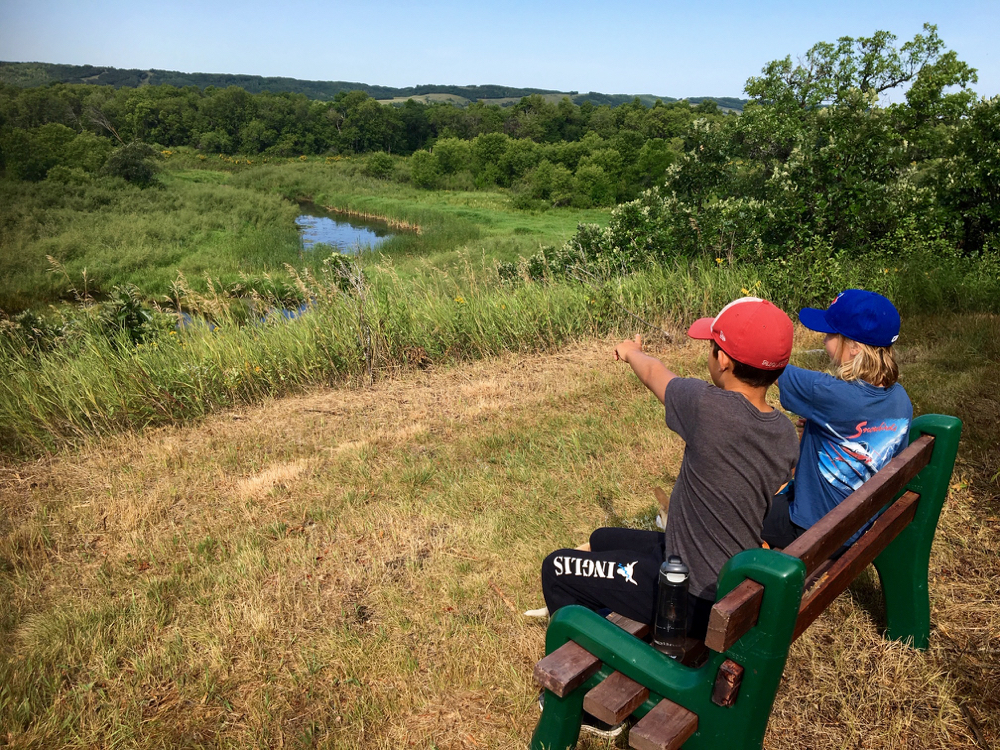 Resting spots for young and old, along the Silver Bend Trail, cast splendid views of natural habitat.