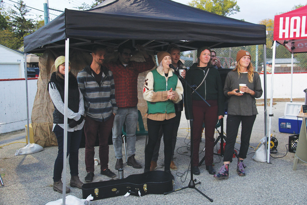 Farm Fresh Food Hub board co-chair Katie Daman announces confirmation of a provincial grant.