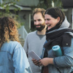 NDP candidate Elizabeth Shearer chats with people at the South Osborne Farmers’ Market.