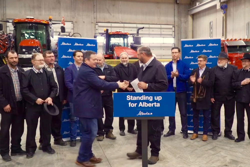 Alberta Premier Jason Kenney steps up to speak at Jumbo Valley Hutterite Colony on Oct. 3, 2019. (Video screengrab from Alberta.ca via YouTube)
