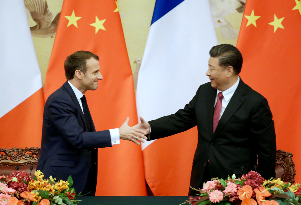 French President Emmanuel Macron shakes hands with China’s President Xi Jinping after a joint news conference at the Great Hall of the People in Beijing, China Nov. 6, 2019.  Photo: Reuters/Jason Lee/POOL
