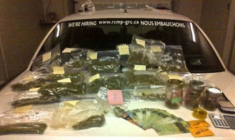St. Pierre-Jolys RCMP in southeastern Manitoba report seizing 1,100 grams of dried marijuana, two cellphones and $700 cash from a 32-year-old Stuartburn-area man during a highway checkstop on Saturday evening (June 8). RCMP said the man produced a Health Canada license authorizing him to possess and produce medical marijuana for his personal use, but the police added in a release that “the evidence seized by officers warrants additional investigation.” The man was quoted in Winnipeg media on Monday as saying he had been arrested and thrown down on the highway, aggravating the injury for which he’s licensed to use the drug. The man was “unco-operative with officers and resisted arrest,” RCMP said, but added no formal charges have been laid. (RCMP photo)

