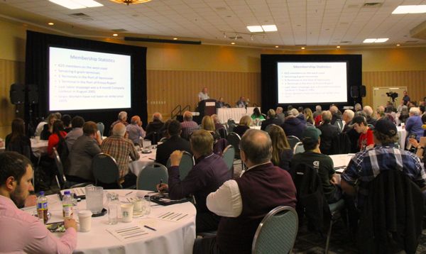 Farmers and ag industry representatives listen to GWU president Gerry Gault at Wednesday&rsquo;s Grain Handling and Transportation Summit in Saskatoon. (Lisa Guenther photo)

