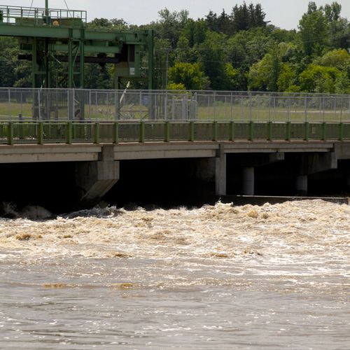 Water churns through the Portage Diversion spillway in Manitoba on July 6. Approaching cooler air masses may bring a reduced chance of rainfall in the region. (Co-operator photo by Shannon VanRaes)
